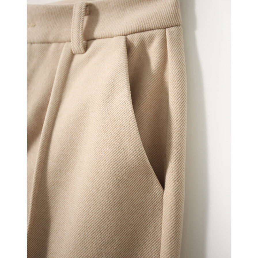 Women's wool tapered trousers by Christine Brewer, featuring a tailored fit and classic style in soft merino wool fabric.