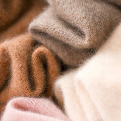 Christine Brewer Gabrielle cashmere turtleneck sweater for women, soft beige knit with a cozy high neckline.