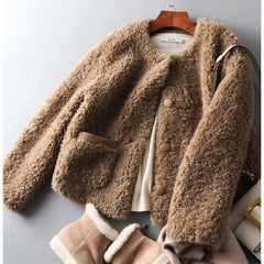 Emily glam faux fur coat for women by Christine Brewer, shown in a luxurious, soft fur texture with a stylish collar.