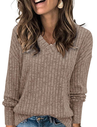 Susanna oversized V-neck sweater for women by Christine Brewer, featuring soft knit fabric and relaxed fit in a cozy style.