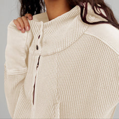 Mia cropped hooded hoodie for women by Christine Brewer, shown in a casual fit with hood and long sleeves.