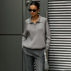 Cream-colored knit sweater for women by Christine Brewer featuring a cozy, textured design and a relaxed fit.
