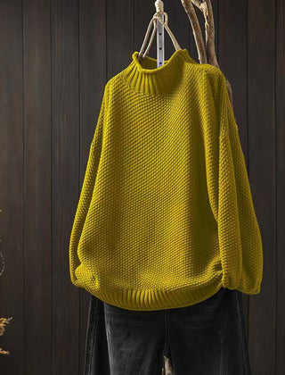 Women’s jade green knit sweater by Christine Brewer, featuring a cozy, textured knit fabric and a relaxed fit.