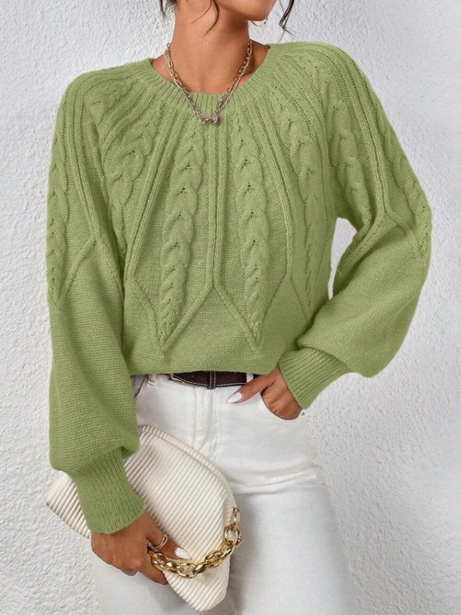 Christine Brewer Naomi classic timeless sweater in soft knit with a crew neckline and long sleeves, displayed on a neutral background.
