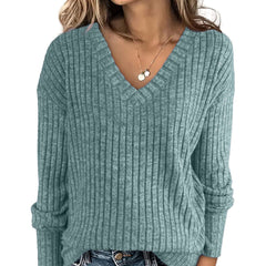 Susanna oversized women's V-neck sweater by Christine Brewer, soft knit fabric, in a cozy, relaxed fit, shown in a neutral color.