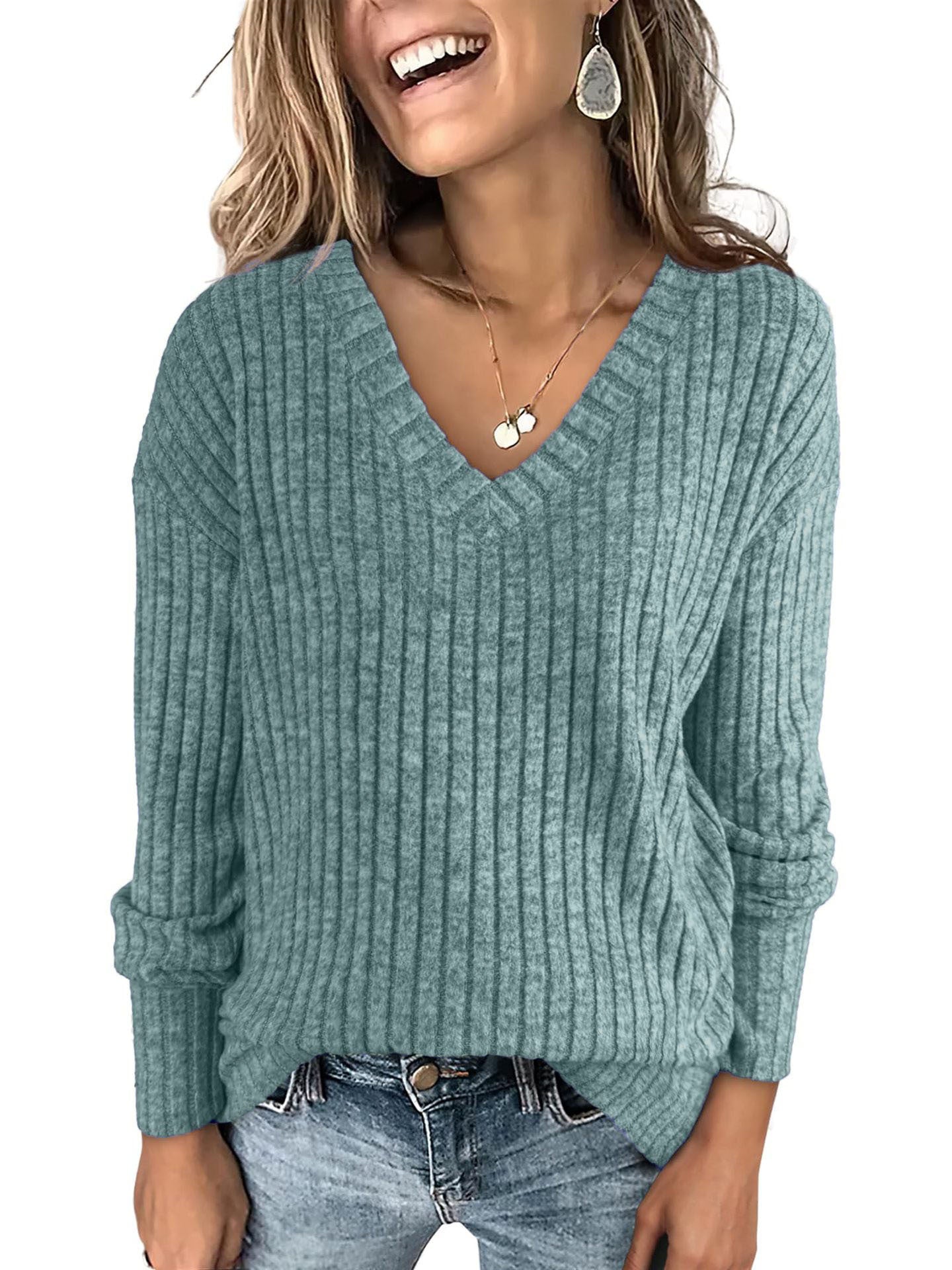 Susanna oversized women's V-neck sweater by Christine Brewer, soft knit fabric, in a cozy, relaxed fit, shown in a neutral color.