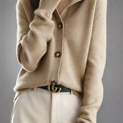 Christina Christine Brewer women's cashmere high neck cardigan in soft beige, featuring a cozy, stylish design with long sleeves.