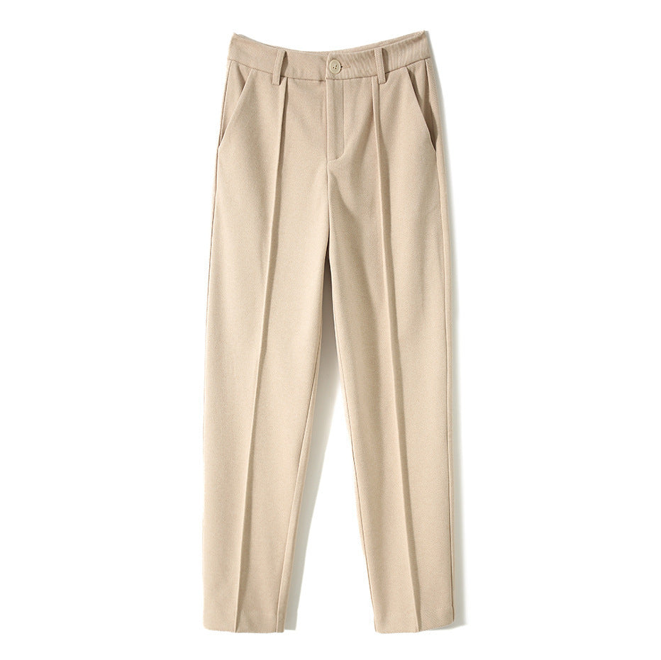 Women's wool tapered trousers by Christine Brewer, featuring a tailored fit and soft merino wool fabric.