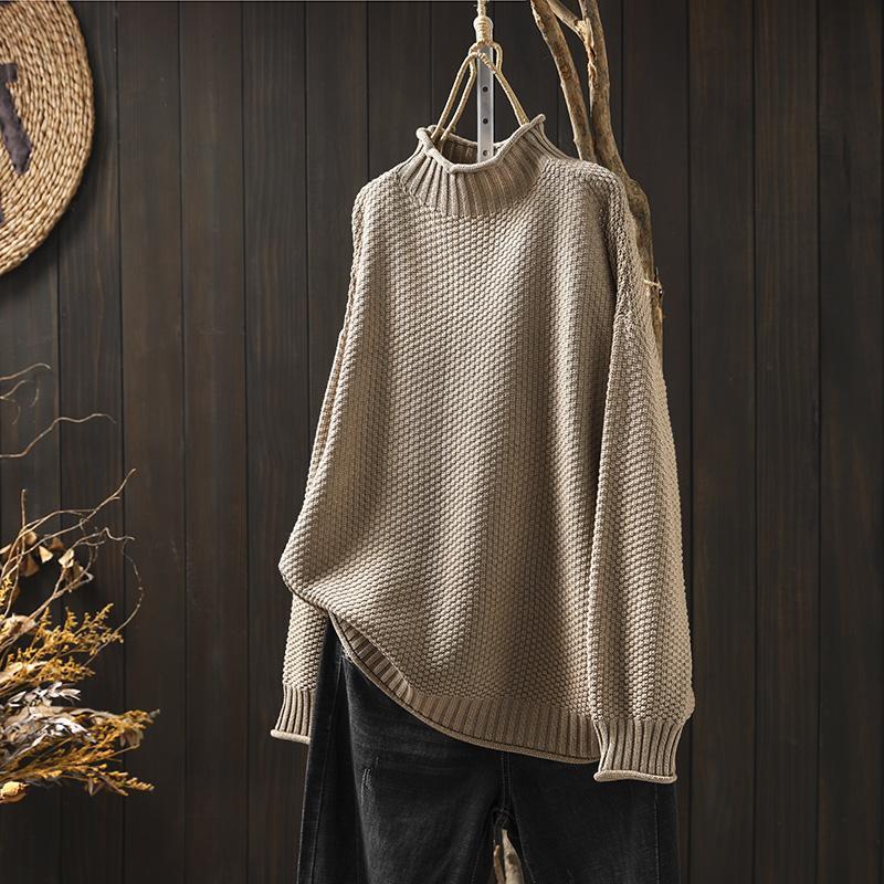 Cream-colored knit sweater for women by Christine Brewer, featuring a cozy Jade design with ribbed cuffs and neckline.