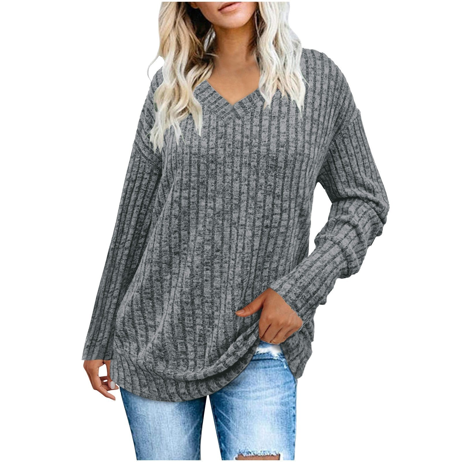 Susanna oversized V-neck sweater for women by Christine Brewer, shown in soft knit fabric, styled with a relaxed fit and long sleeves.
