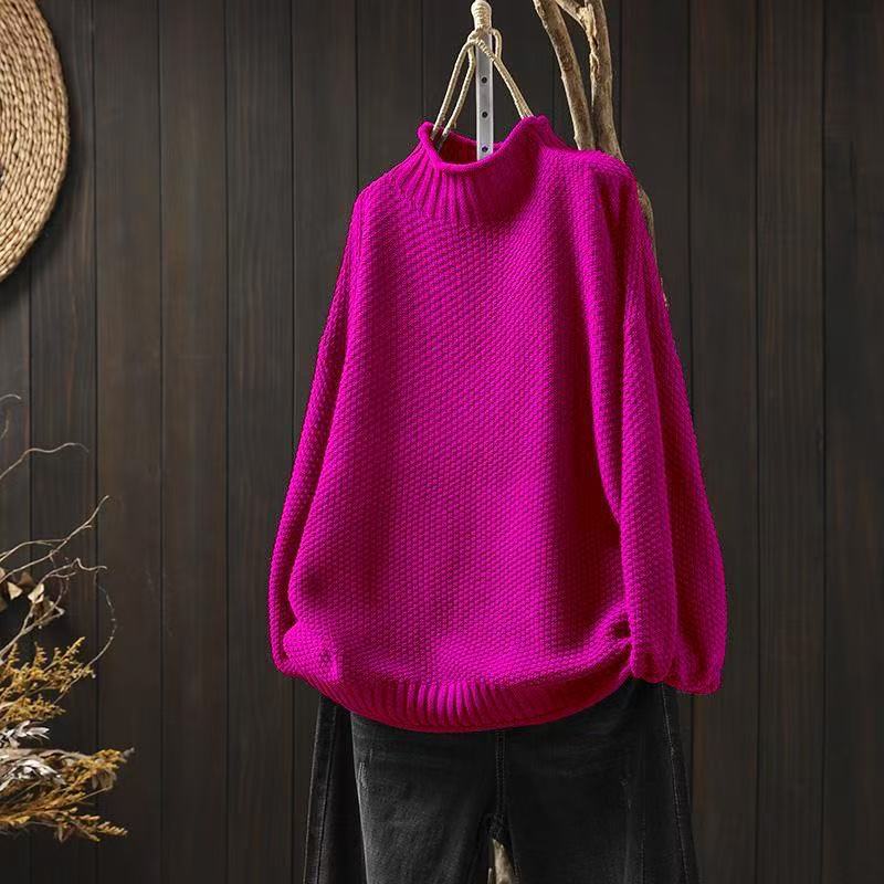 Jade knit sweater for women by Christine Brewer, featuring a cozy, textured design in soft green yarn.