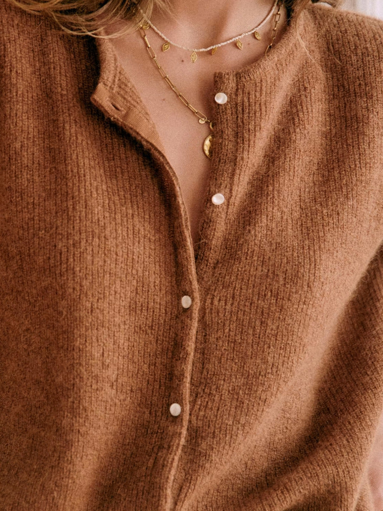 Hattie mohair knit top for women by Christine Brewer, soft cream-colored sweater with a relaxed fit and textured knit pattern.