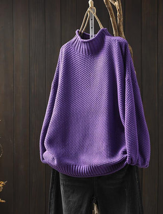 Jade green knit sweater for women by Christine Brewer, featuring a cozy, textured design and long sleeves.