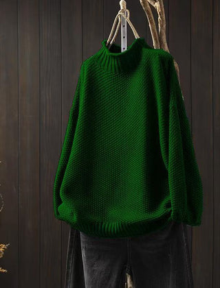 Women’s jade green knit sweater by Christine Brewer, featuring a cozy, textured fabric and a classic fit.