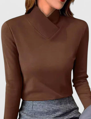 Charlotte Versatile Chic Turtleneck Sweater by Christine Brewer, featuring a cozy knit design in a neutral color.