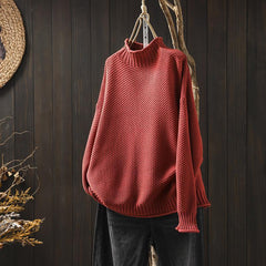 Jade green knit sweater for women by Christine Brewer, featuring a cozy, textured design and a relaxed fit.