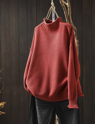 Jade green knit sweater for women by Christine Brewer, featuring a cozy, textured design and a relaxed fit.