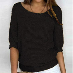 Women’s Bianca knit sweater by Christine Brewer, cream-colored, cozy knit fabric, worn casually with a relaxed fit.
