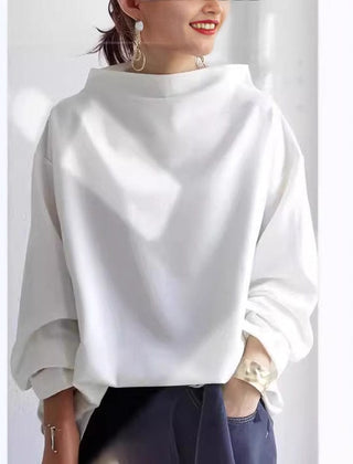 Christine Brewer Isabella soft knit high neck top in versatile, sophisticated design, shown in a close-up view highlighting the fabric.