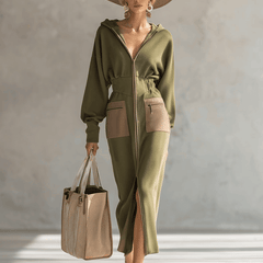 Green long sleeve maxi dress by Christine Brewer featuring elegant evening dress design with flowing fabric and fitted silhouette.