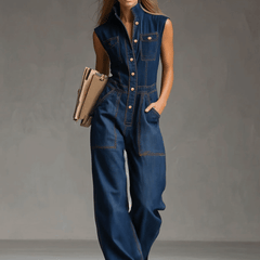 Dark blue denim sleeveless balloon jumpsuit with multiple pockets, designed for women by Christine Brewer.