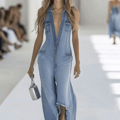 Light blue denim sleeveless wide-leg jumpsuit with raw edges for women by Christine Brewer, shown on a hanger.