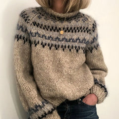 Olivia Klein winter turtleneck sweater featuring the Elena classic cozy Nordic sweater by Christine Brewer, with intricate knit patterns.