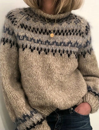 Olivia Klein winter turtleneck sweater featuring the Elena classic cozy Nordic sweater by Christine Brewer, with intricate knit patterns.