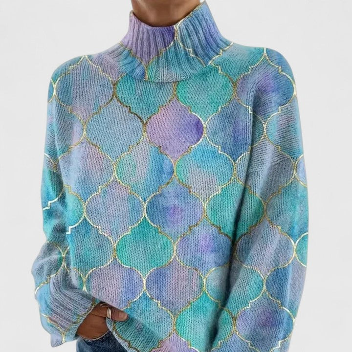 Cream-colored Lindsey high neck sweater for women by Christine Brewer, shown on a plain background.