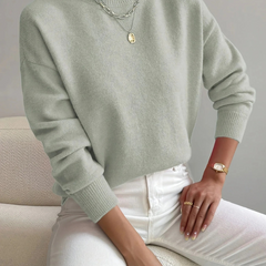 Cream high neck sweater for women by Christine Brewer, featuring a cozy, stylish design with a fitted silhouette.