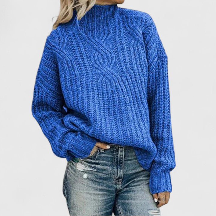 Pink cable knit sweater for women, Christine Brewer's Tabitha NL287, featuring a cozy, textured design.