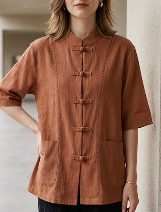 Orange women's summer blouse by Christine Brewer featuring denim pockets and a lightweight, casual top for warm weather.