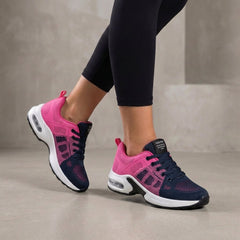 Pink and blue knit sneakers for women by Christine Brewer, showcasing comfortable, stylish women's shoes with a colorful design.