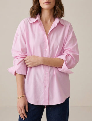 Pink women's linen summer top by Christine Brewer featuring a button-front design and a comfortable, stylish fit.