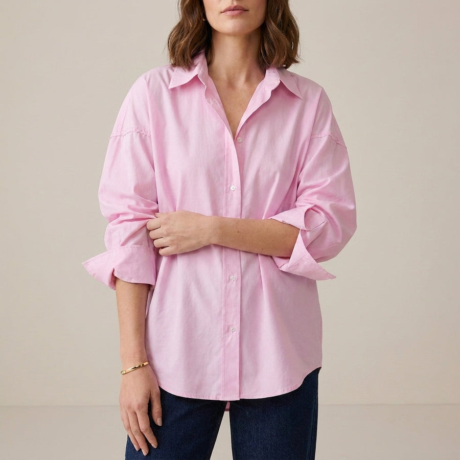 Pink women's linen summer top by Christine Brewer featuring a button-front design and a comfortable, stylish fit.
