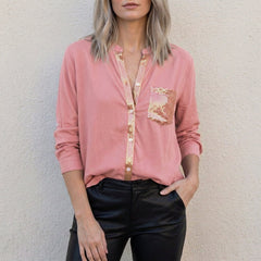 Pink women's summer blouse with V-neck and denim button front, styled as a casual top by Christine Brewer.