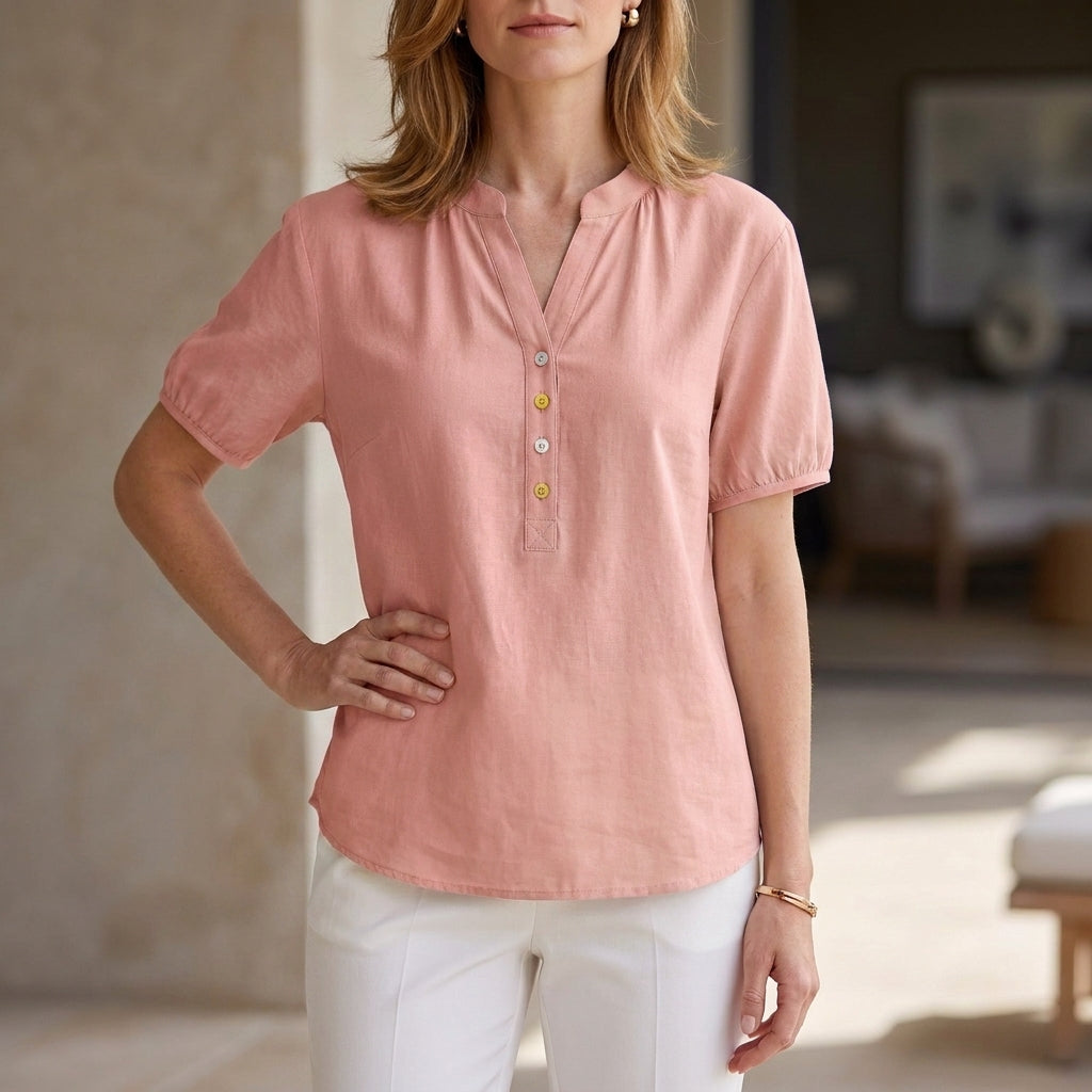 Pink denim summer blouse for women with puff sleeves and button front, lightweight and stylish by Christine Brewer.