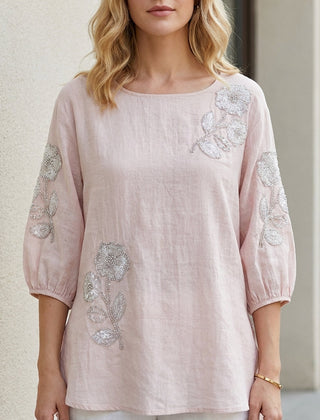 Pink floral summer blouse for women with puff sleeves, stylish top by Christine Brewer, perfect for warm-weather fashion.