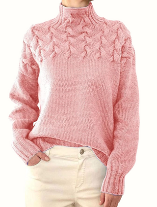Pink women's turtleneck sweater from Christine Brewer's Tessa knitwear collection, showcasing a cozy and stylish design.