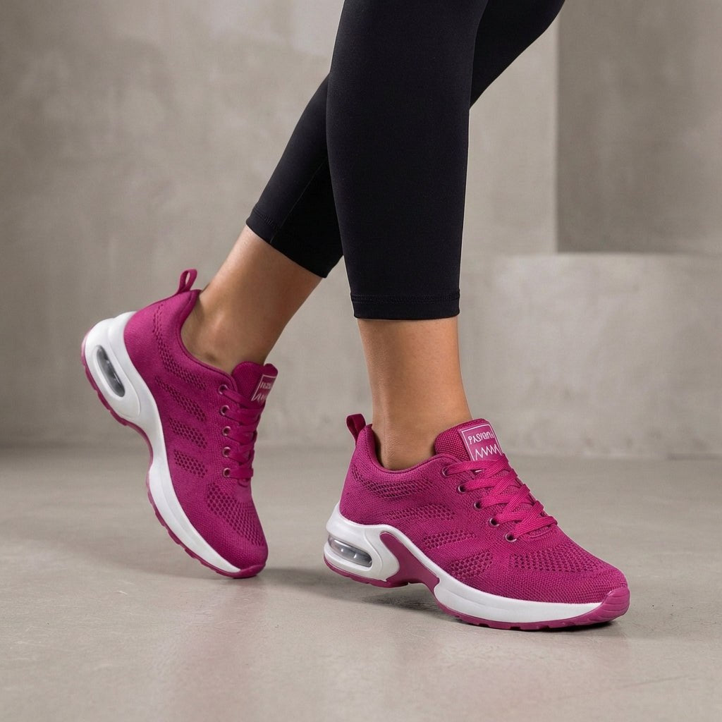 Purple knit sneakers for women by Christine Brewer, showcasing a comfortable and stylish women's shoe design.