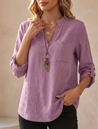 Purple women's V-neck linen blouse by Christine Brewer, flowy summer top with a relaxed fit and stylish design.