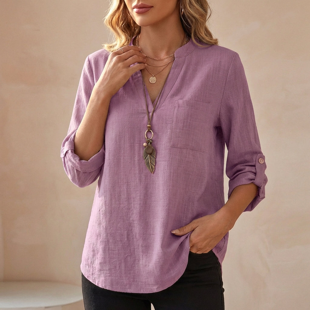 Purple women's V-neck linen blouse by Christine Brewer, flowy summer top with a relaxed fit and stylish design.