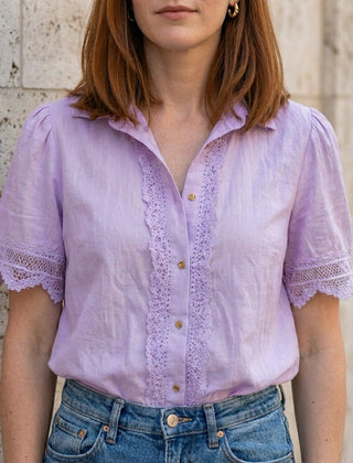 Purple women's summer blouse with V-neck, short sleeves, and lace details, by Christine Brewer.