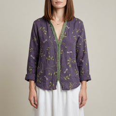 Purple floral summer blouse for women with V-neck and long sleeves, made of linen by Christine Brewer.