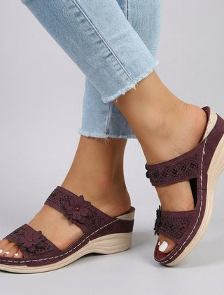 Red floral strap wedge heeled sandals for women by Christine Brewer, featuring a stylish design and comfortable wedge heel.