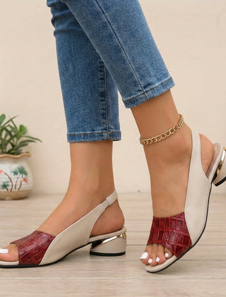 Red textured slingback block heel sandals with open toe and gold accent by Christine Brewer, stylish and comfortable footwear.