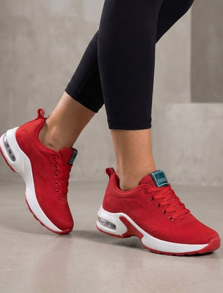 Red knit sneakers for women by Christine Brewer, stylish women's shoes with a comfortable, textured knit design.
