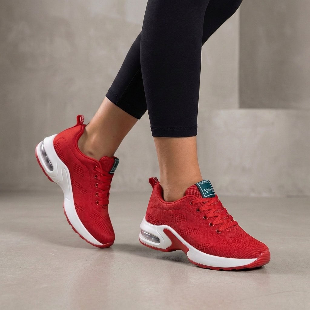 Red knit sneakers for women by Christine Brewer, stylish women's shoes with a comfortable, textured knit design.