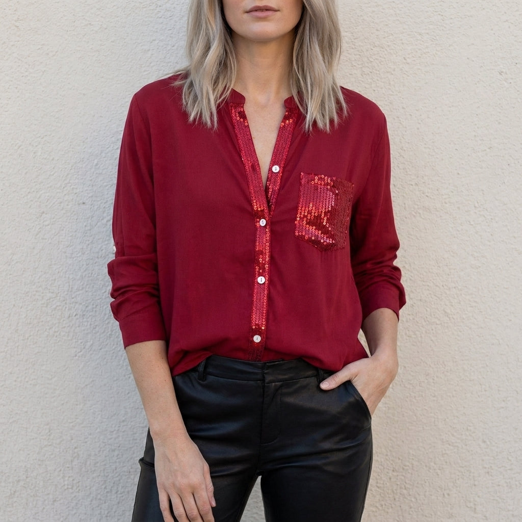 Red women's summer blouse by Christine Brewer featuring a V-neck, denim fabric, and button-front design.