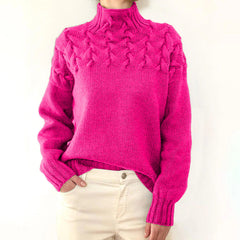 Light pink Tessa turtleneck sweater for women from Christine Brewer, featuring cozy knitwear and a classic turtleneck design.